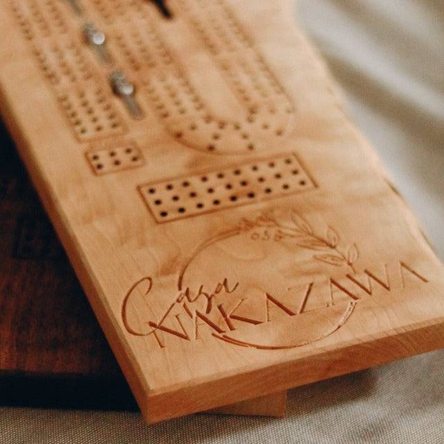 Custom-engraved cribbage board